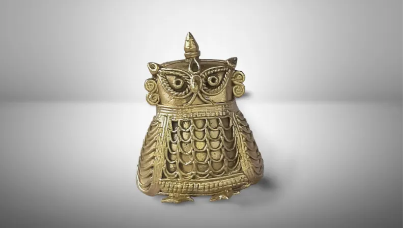 Owl for Home Decoration. 
Made using Dokra metal casting technique. 
