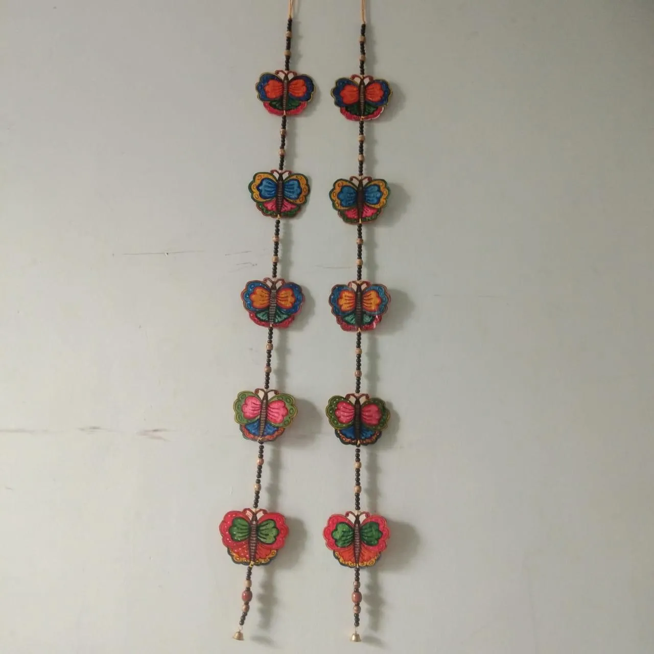 Handpainted decorative wallhanging.
Made of leather.