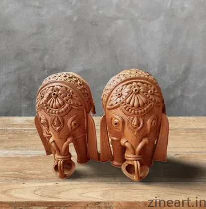 Elephant pair.
Made of fired clay.
