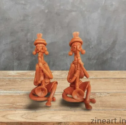 Two musicians. 
Made of fired clay.
