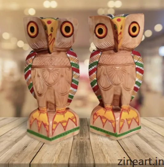Pair of Owls.
Made of Hand crafted Wood. 
