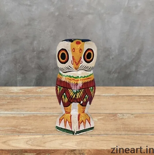 cute beautiful Owls.
Made of Hand crafted Wood. 
